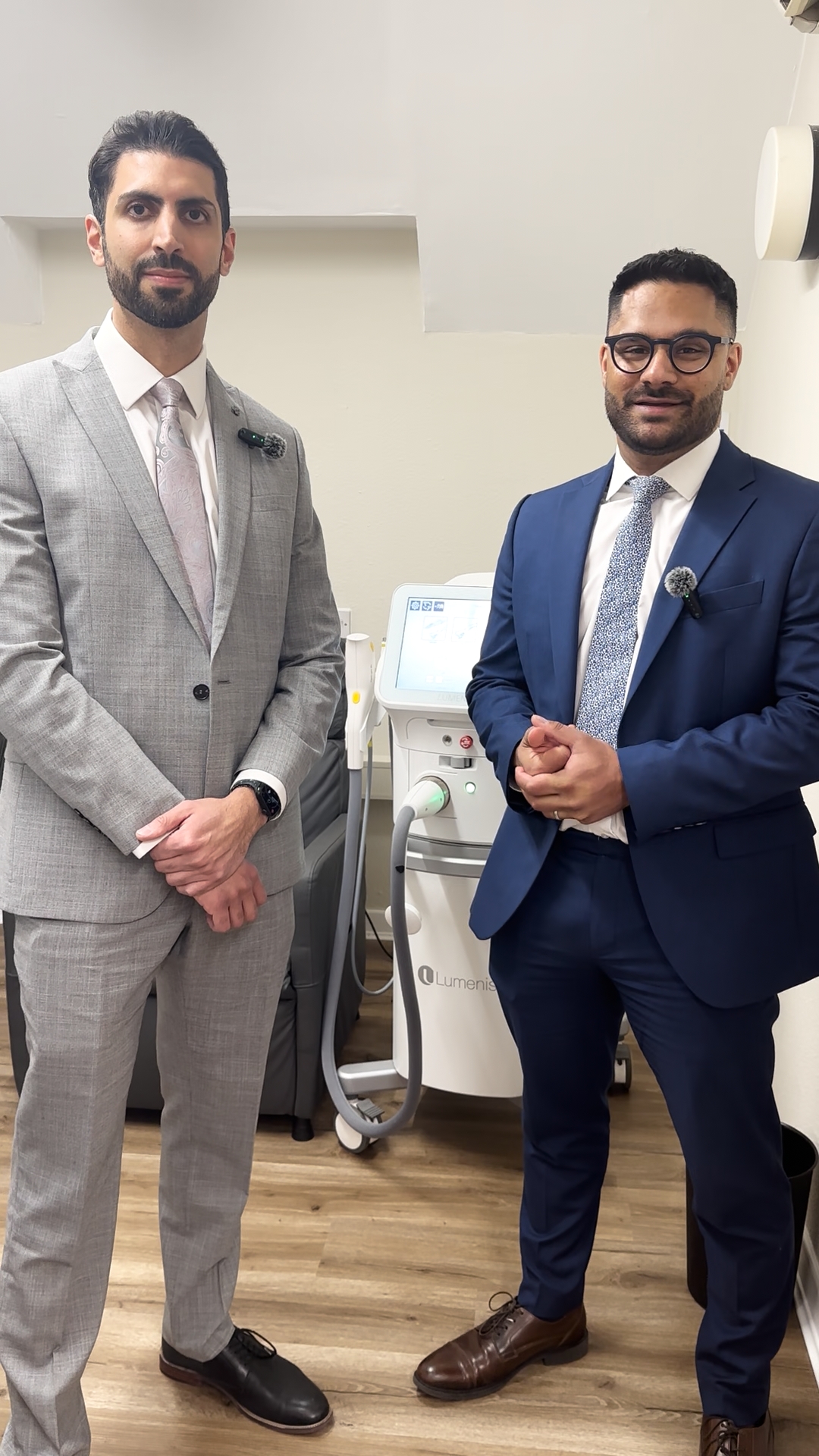 Two Opticare specialist optometrists alongside the Lumenis OptiLIGHT IPL system in the Newark dry eye clinic